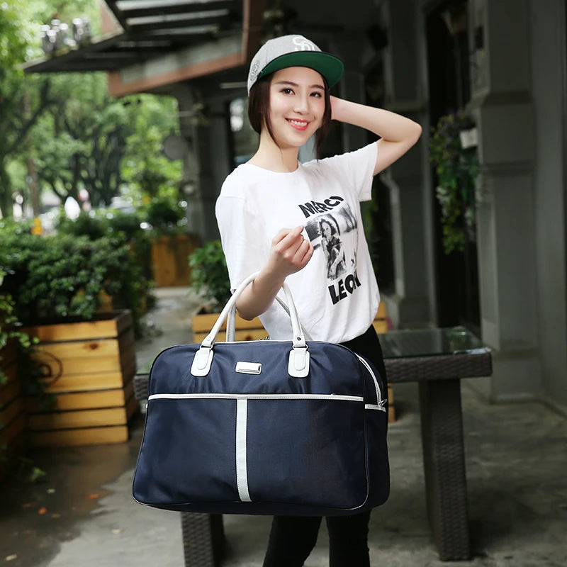 Large Capaci Travel Bag Women's Lightweight Pull Bag Portable ort Trip Hand Lage Bag with Wheels Faionable Ox Cloth