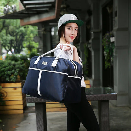 Large Capaci Travel Bag Women's Lightweight Pull Bag Portable ort Trip Hand Lage Bag with Wheels Faionable Ox Cloth